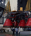 aft end of Saturn V with people for scale